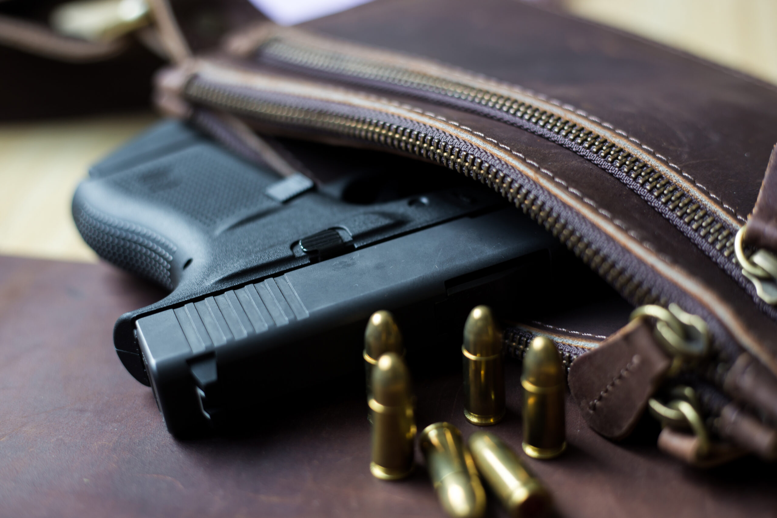 Person being arrested after police find a ghost gun in their backpack in California.