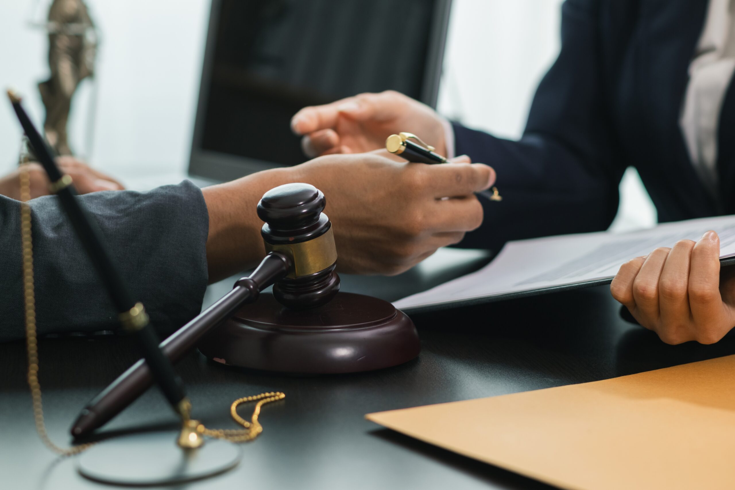 Person reading legal papers after being served – what to do when you get served with a restraining order.